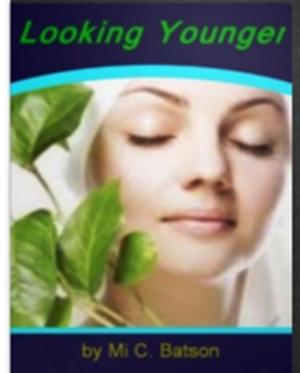 Cover of the book Looking Younger by Katheryn M. Teeter