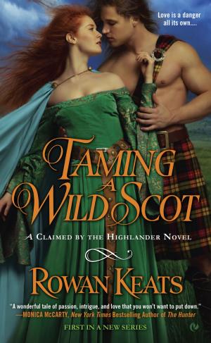 Cover of the book Taming a Wild Scot by M.L. Brennan