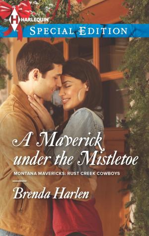 Cover of the book A Maverick under the Mistletoe by Laura Drake