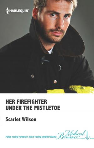 Cover of the book Her Firefighter Under the Mistletoe by Heather Graham