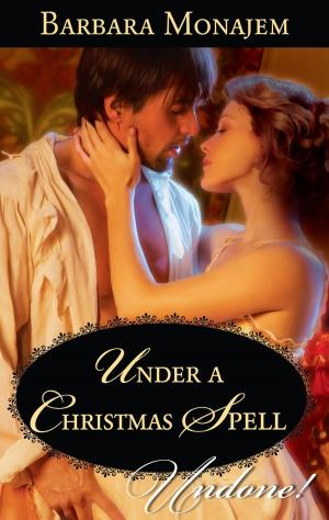 Cover of the book Under a Christmas Spell by Karen Rose Smith, Meg Maxwell, Tracy Madison