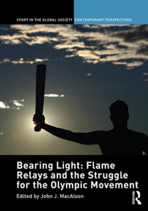 Cover of the book Bearing Light: Flame Relays and the Struggle for the Olympic Movement by David Brown