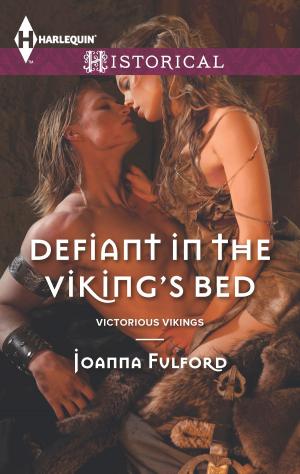 Cover of the book Defiant in the Viking's Bed by Delores Fossen