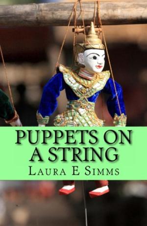 Cover of the book Puppets on a String by Laura E Simms