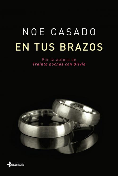 Cover of the book En tus brazos by Noe Casado, Grupo Planeta