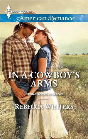 Cover of the book In a Cowboy's Arms by R.S. Reed