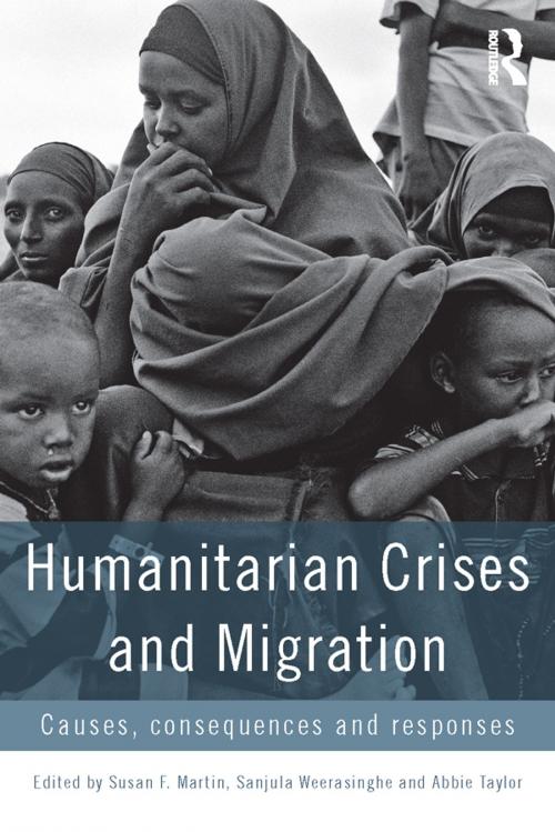 Cover of the book Humanitarian Crises and Migration by , Taylor and Francis