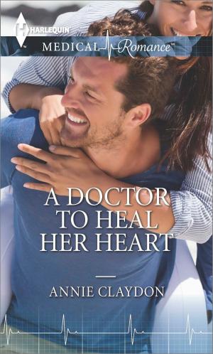 Cover of the book A Doctor to Heal Her Heart by Linda Thomas-Sundstrom, Deborah LeBlanc