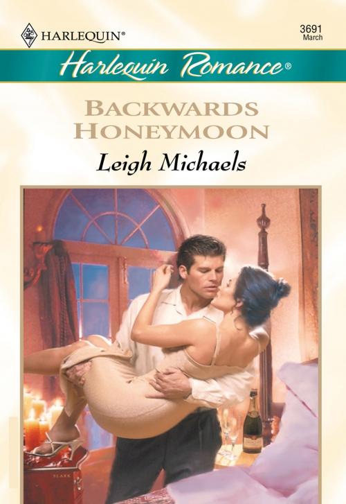 Cover of the book Backwards Honeymoon by Leigh Michaels, Harlequin