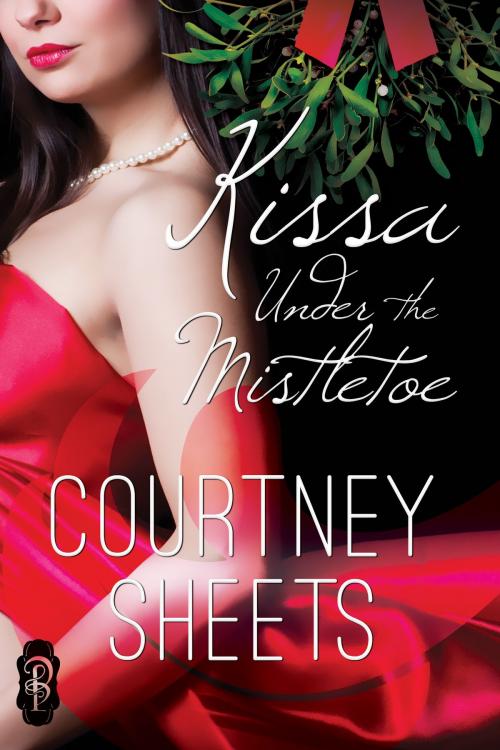 Cover of the book Kissa Under the Mistletoe by Courtney Sheets, Decadent Publishing Company