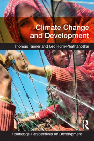 Cover of the book Climate Change and Development by Ying Zhu, Malcolm Warner, Shuang Ren, Ngan Collins