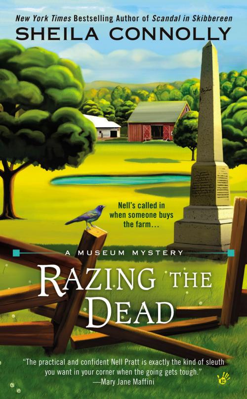Cover of the book Razing the Dead by Sheila Connolly, Penguin Publishing Group