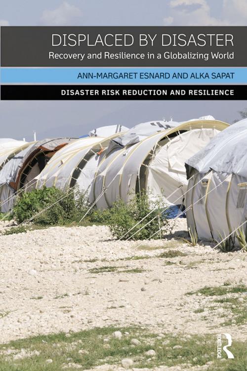 Cover of the book Displaced by Disaster by Ann-Margaret Esnard, Alka Sapat, Taylor and Francis