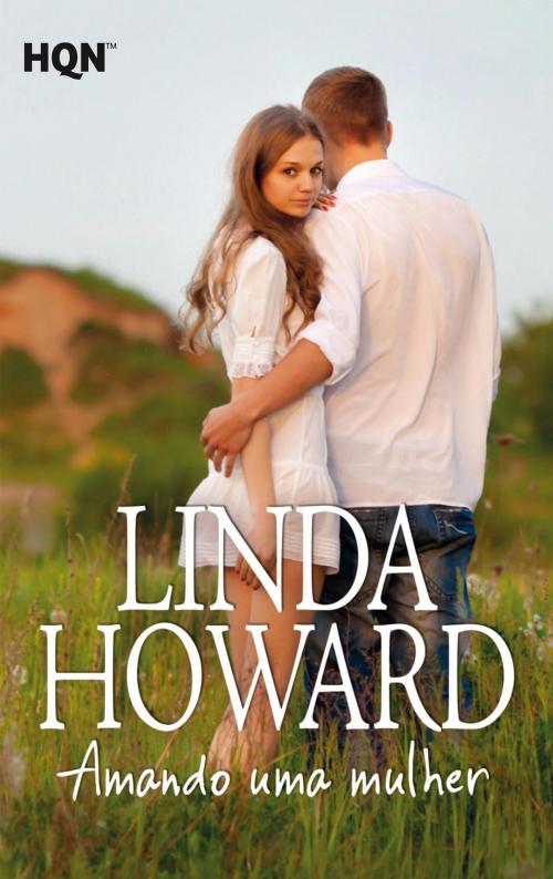 Cover of the book Amando uma mulher by Linda Howard, Harlequin, uma divisão de HarperCollins Ibérica, S.A.
