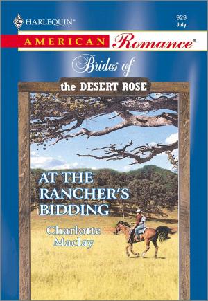 Cover of the book At the Rancher's Bidding by Julie Kenner