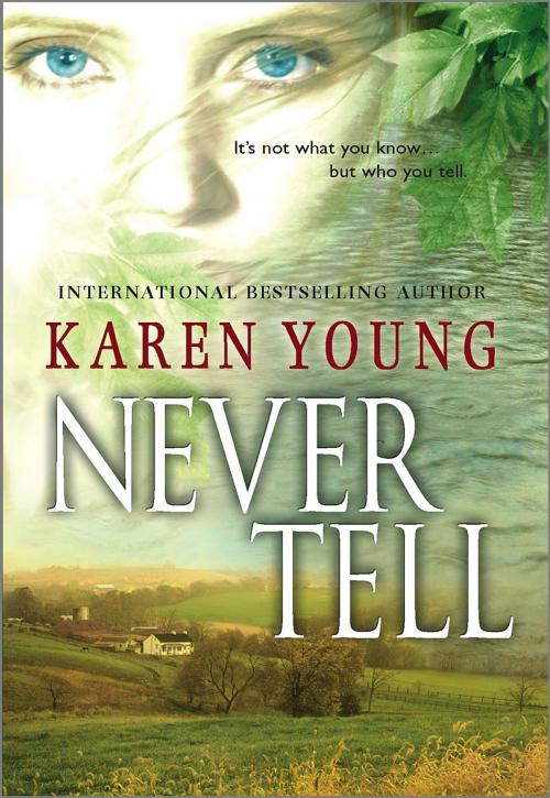 Cover of the book Never Tell by Karen Young, MIRA Books