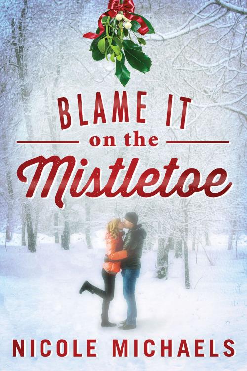 Cover of the book Blame It on the Mistletoe by Nicole Michaels, St. Martin's Press