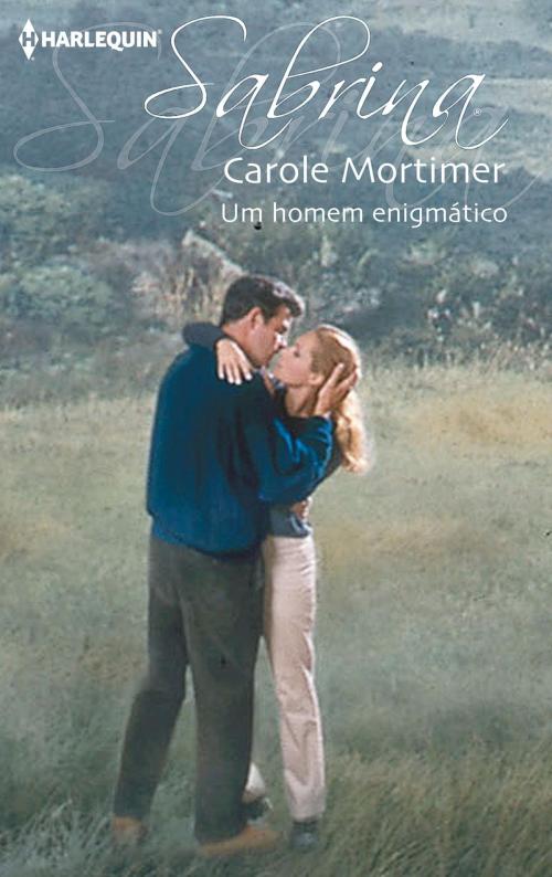 Cover of the book Um homem enigmático by Carole Mortimer, Harlequin, uma divisão de HarperCollins Ibérica, S.A.