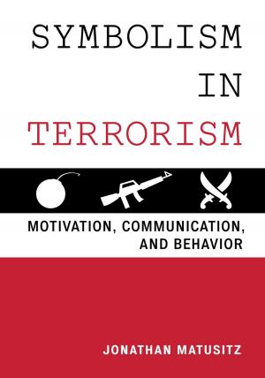 Cover of the book Symbolism in Terrorism by George A. Baker III, Robert R. Rose, John E. Roueche Ph.D, president, Roueche Graduate Center, National American University