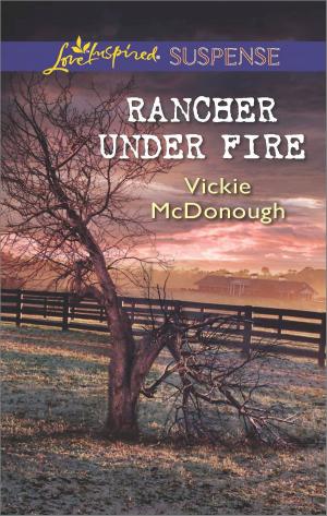Cover of the book Rancher Under Fire by Rita Herron