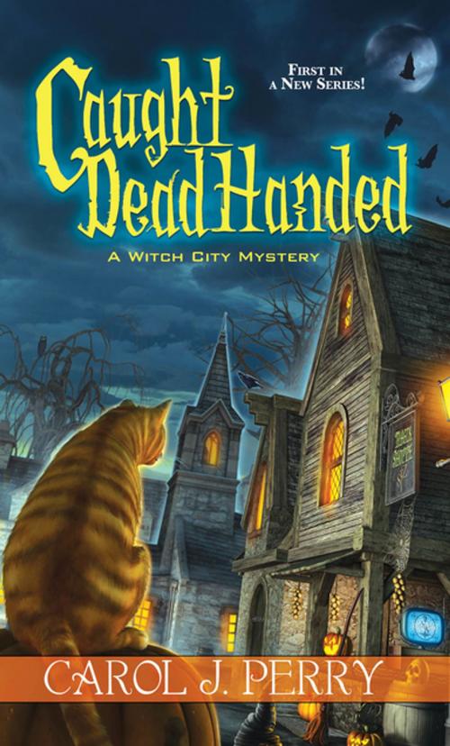 Cover of the book Caught Dead Handed by Carol J. Perry, Kensington Books