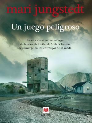 Cover of the book Un juego peligroso by Agnete Friis, Lene Kaaberbøl