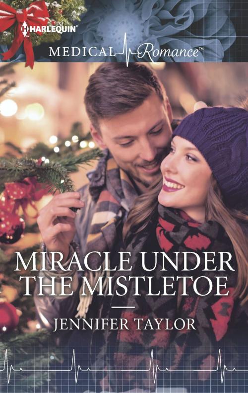 Cover of the book Miracle Under the Mistletoe by Jennifer Taylor, Harlequin