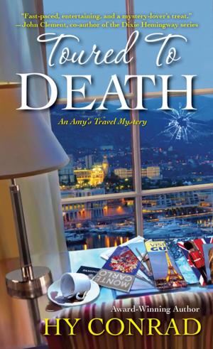 Cover of the book Toured to Death by Leslie Meier