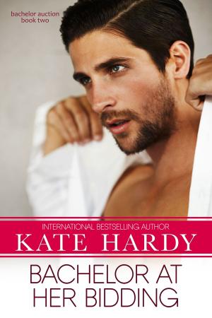 Cover of the book Bachelor at Her Bidding by Tracey Alvarez