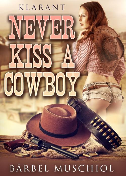 Cover of the book Never kiss a cowboy. Erotischer Roman by Bärbel Muschiol, Klarant