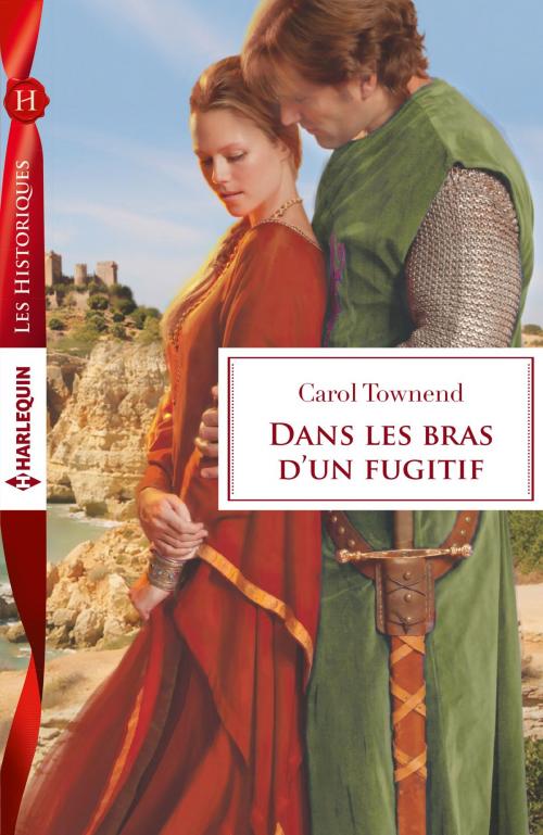 Cover of the book Dans les bras d'un fugitif by Carol Townend, Harlequin