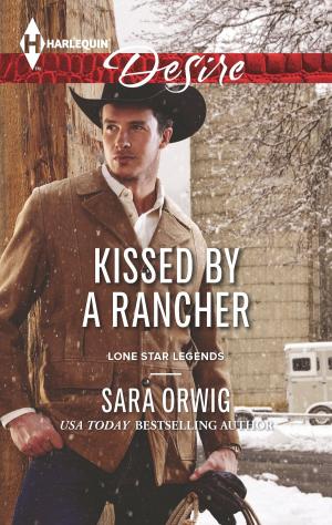 bigCover of the book Kissed by a Rancher by 