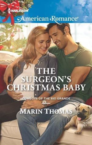 Cover of the book The Surgeon's Christmas Baby by Charlene Sands
