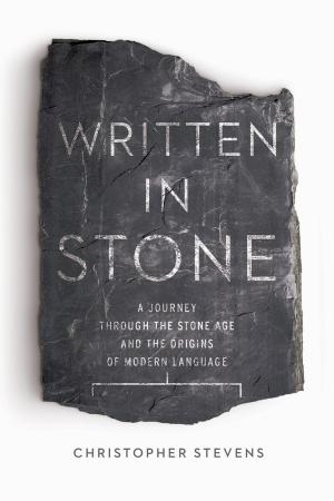 Cover of the book Written in Stone: A Journey Through the Stone Age and the Origins of Modern Language by Denny Waxman, Michio Kushi