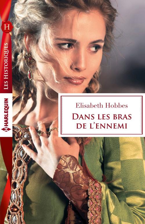 Cover of the book Dans les bras de l'ennemi by Elisabeth Hobbes, Harlequin