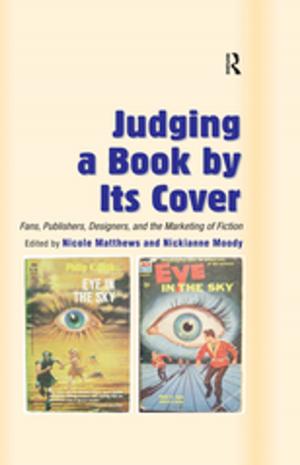 Cover of the book Judging a Book by Its Cover by Michael McGuire