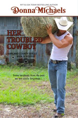 Cover of the book Her Troubled Cowboy by Donna Michaels, Suspense Sisters