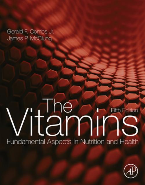 Cover of the book The Vitamins by Gerald F. Combs, Jr., James P. McClung, Elsevier Science