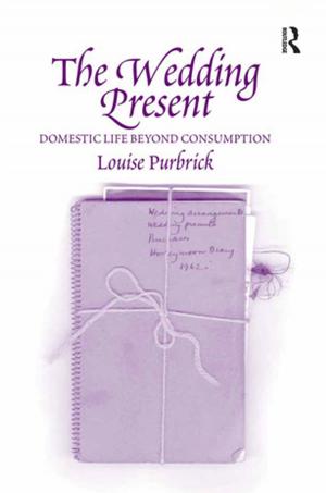Cover of the book The Wedding Present by Adrienne E Gavin, Carolyn W de la L Oulton, SueAnn Schatz, Vybarr Cregan-Reid