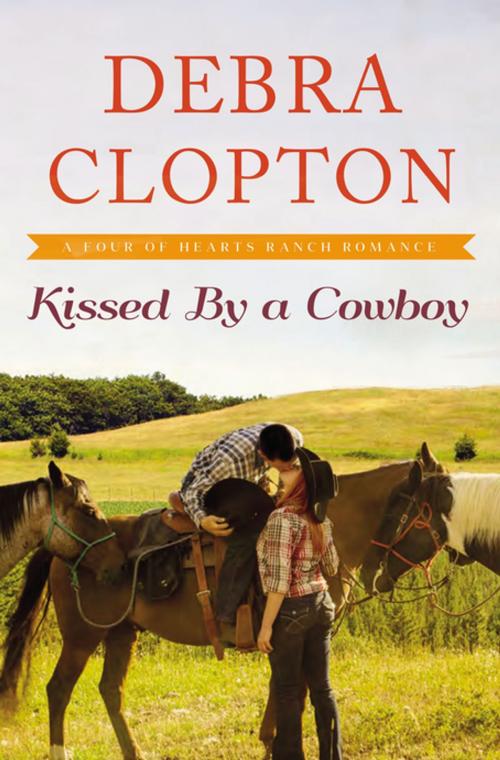 Cover of the book Kissed by a Cowboy by Debra Clopton, Thomas Nelson