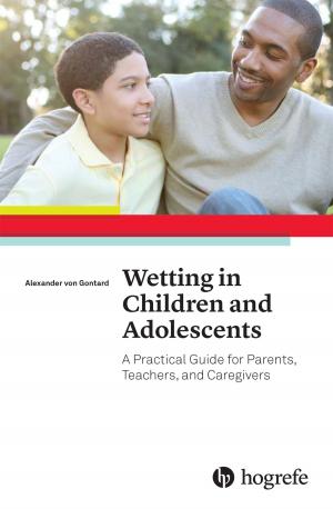 Cover of the book Wetting in Children and Adolescents by William R. Holcomb