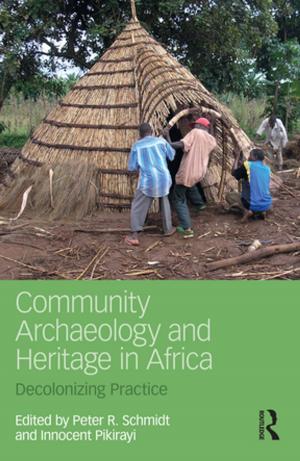 Cover of the book Community Archaeology and Heritage in Africa by Mark D. Mamrack