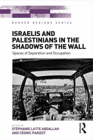 Cover of the book Israelis and Palestinians in the Shadows of the Wall by Andrew M. Cooper