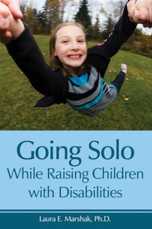 Cover of the book Going Solo While Raising Children with Disabilities by Lara Delmolino, Ph.D., BCBA-D, Sandra L. Harris, Ph.D