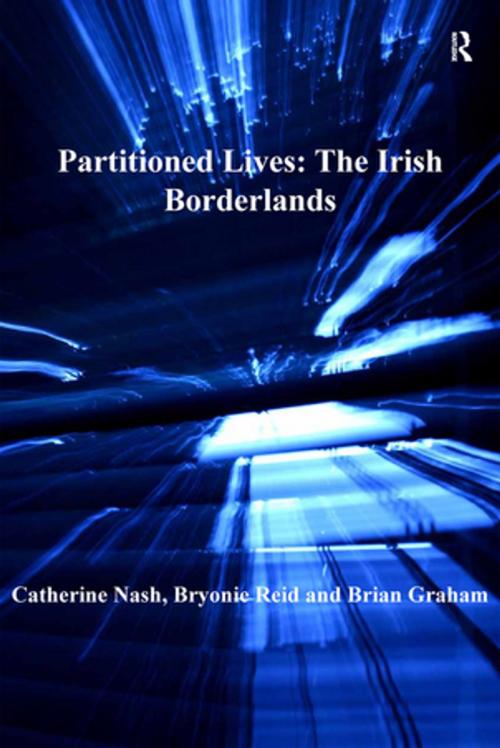 Cover of the book Partitioned Lives: The Irish Borderlands by Catherine Nash, Bryonie Reid, Taylor and Francis