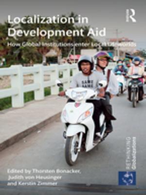 Cover of the book Localization in Development Aid by Jeffrey T Huber, Kris Riddlesperger