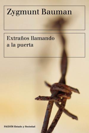 Book cover of Extraños llamando a la puerta