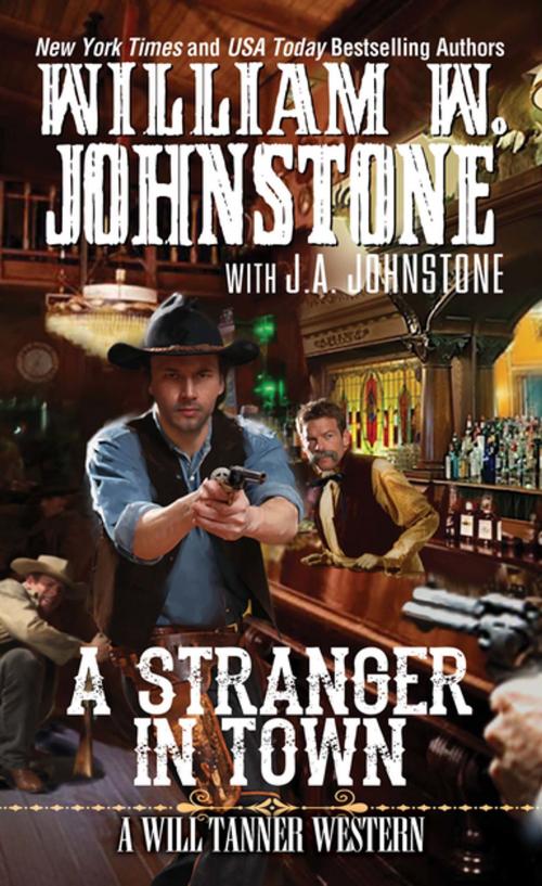 Cover of the book A Stranger in Town by William W. Johnstone, J.A. Johnstone, Pinnacle Books