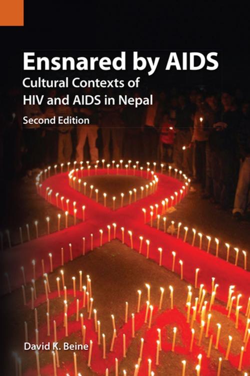Cover of the book Ensnared by AIDS by David K. Beine, SIL International