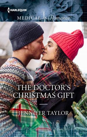 Cover of the book The Doctor's Christmas Gift by Jessica Steele